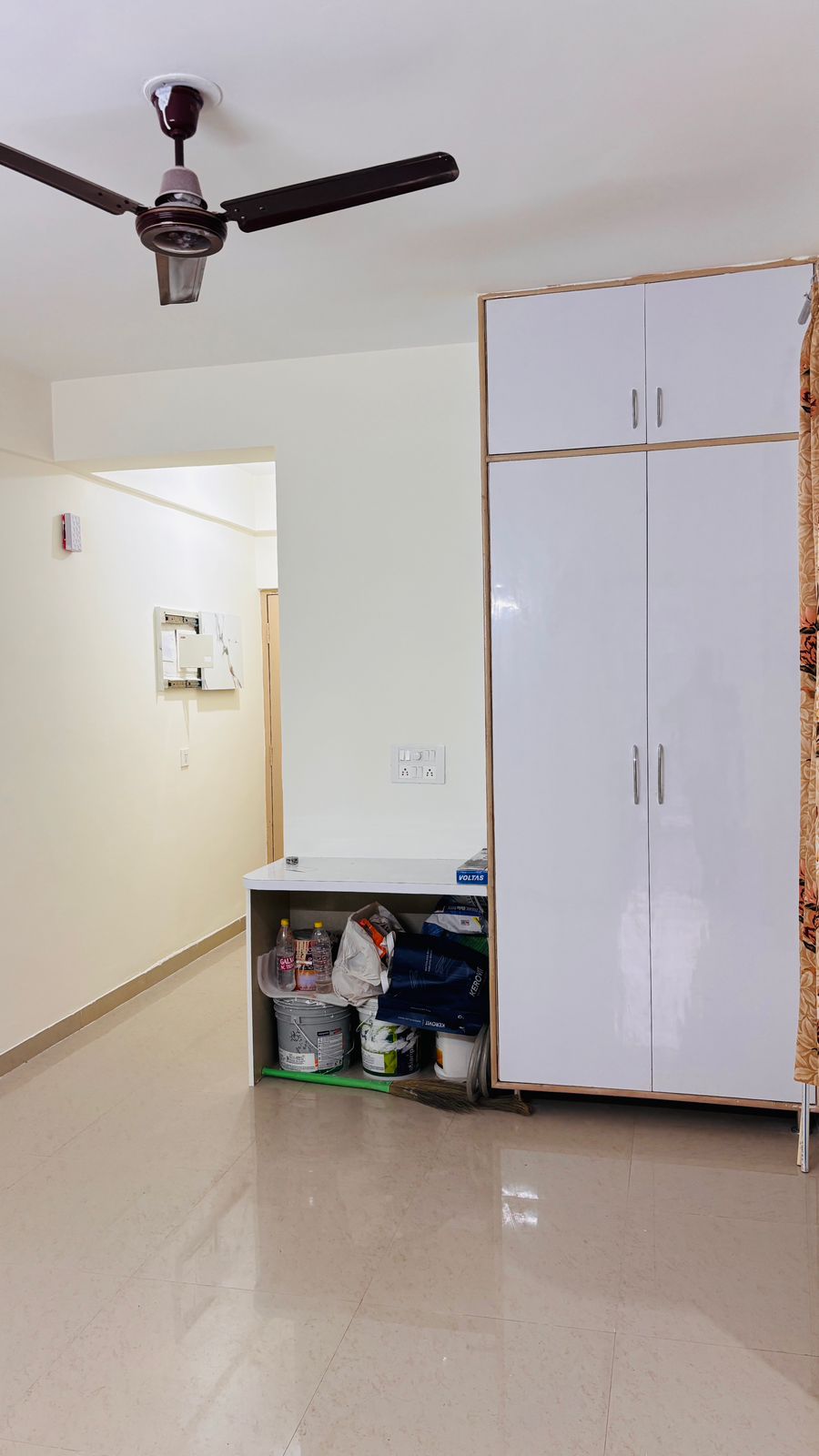 Minimalist room with storage cabinet